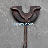 cambered induction coils for induction quenching